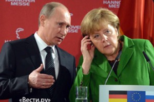 Путин попросил Меркель форсировать решение проблем
